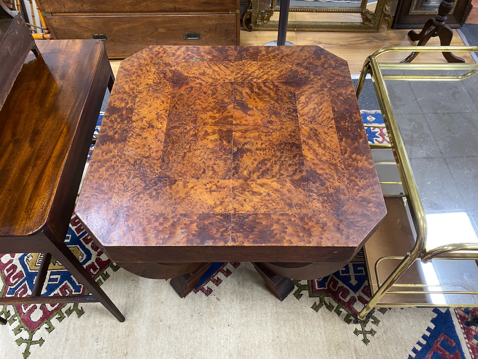 An Art Deco style octagonal thuya wood centre table, width 71cm, height 69cm.